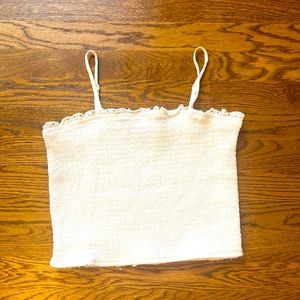 white tank top slightly cropped